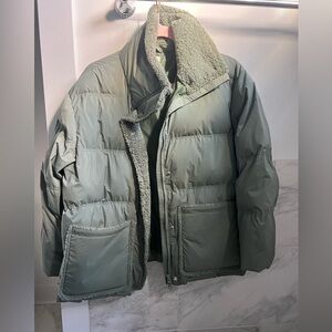 Green puffer coat